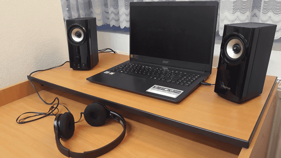 Laptop with Creative T-60